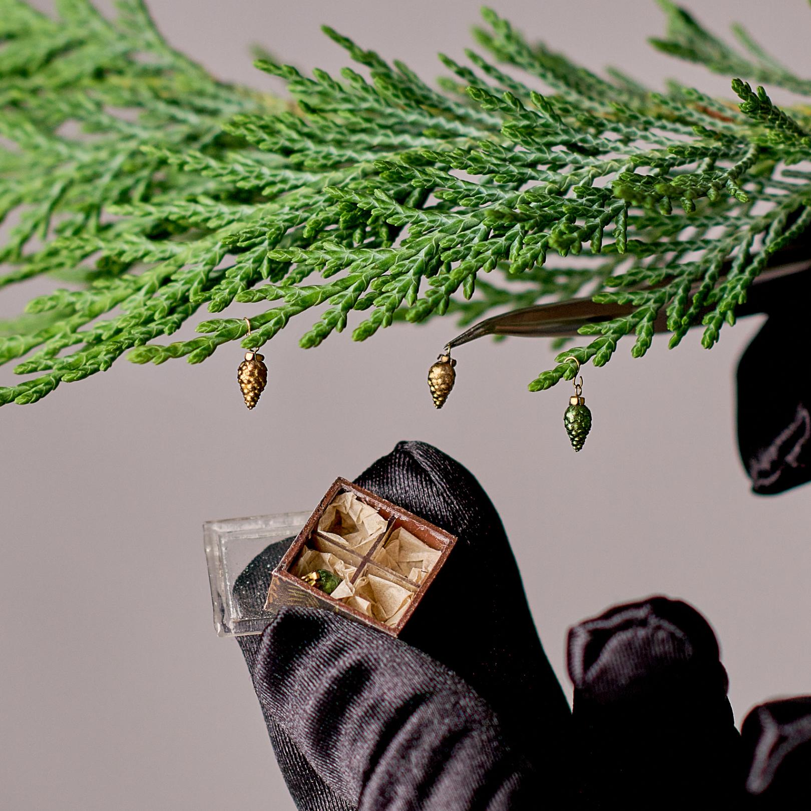 Christmas ornaments set in the box. Antique gold and green with reflected effect 4 ornaments.