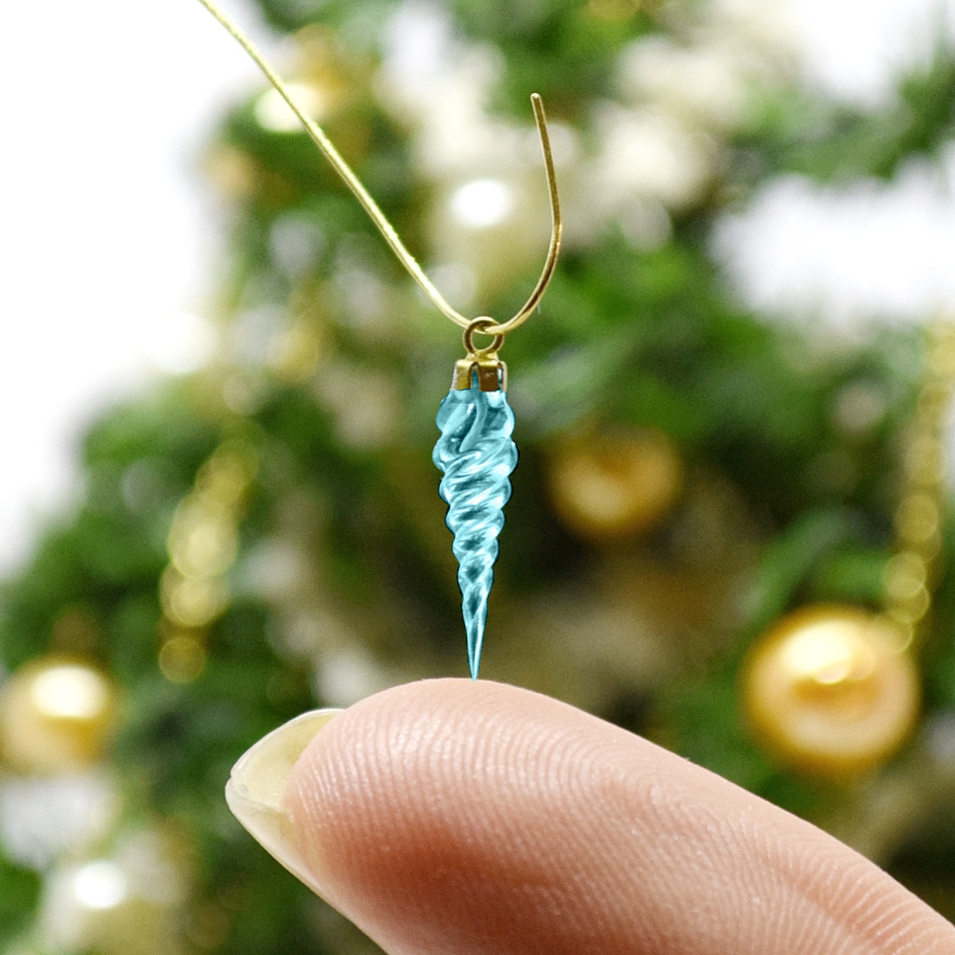 Xmas ornament. Painted. Icicle twisted blue.