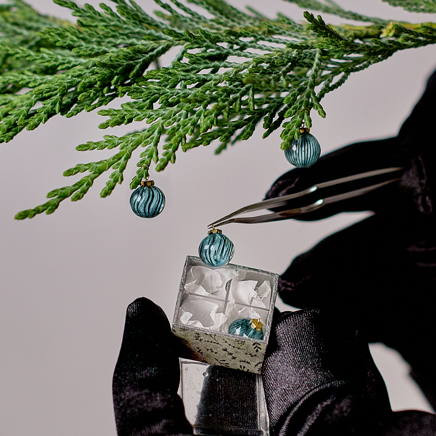 Christmas ornaments set in the box. Light teal with ageing effect 4 ornaments.