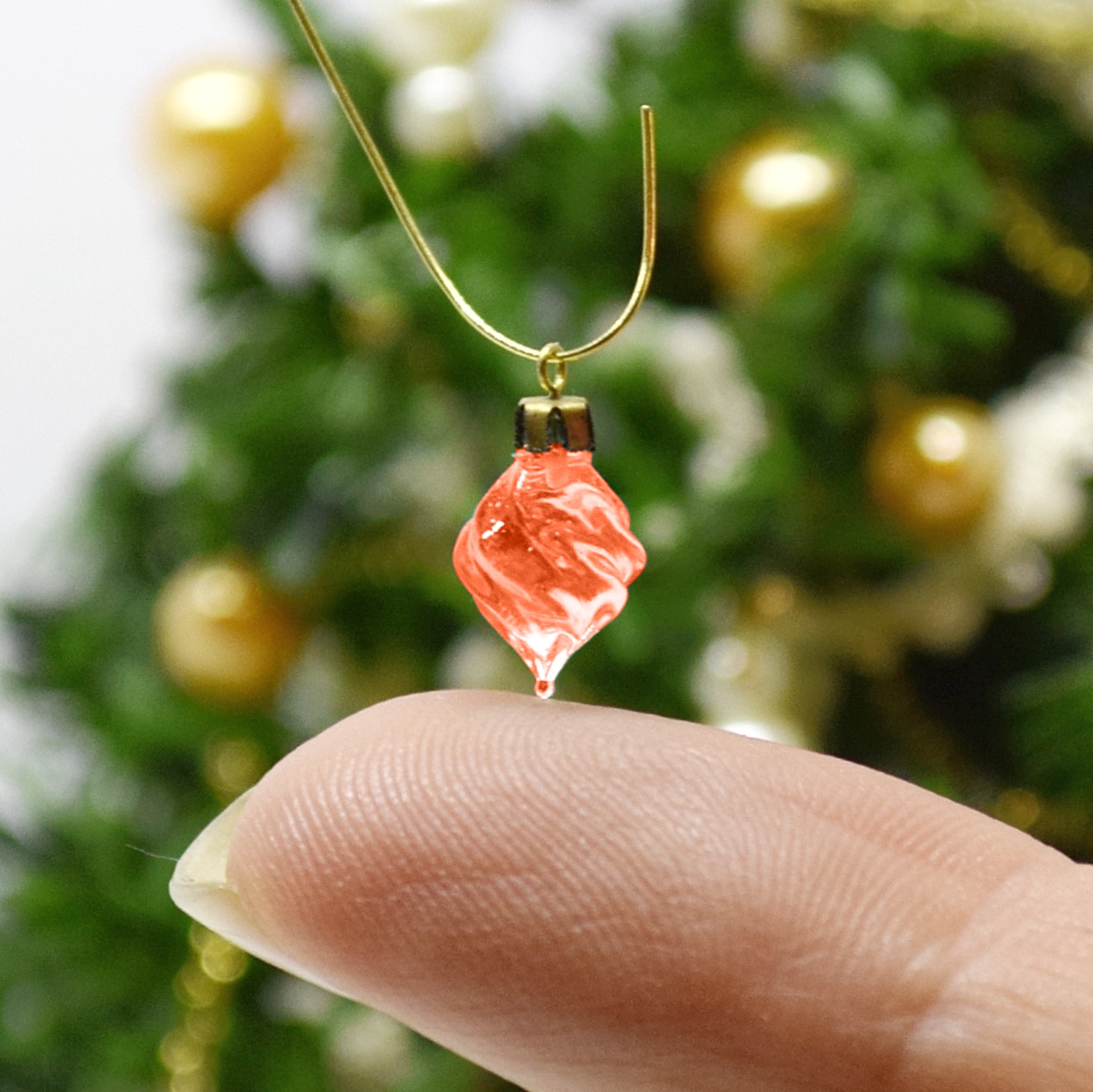 Xmas ornament. Painted. Drop twisted red.