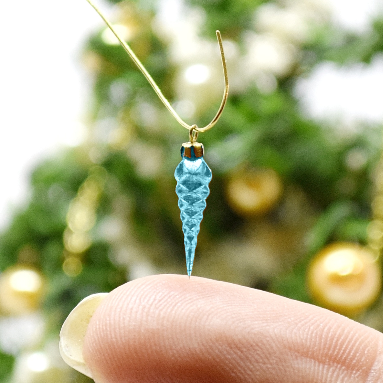 Xmas ornament. Painted. Icicle rhombus blue.