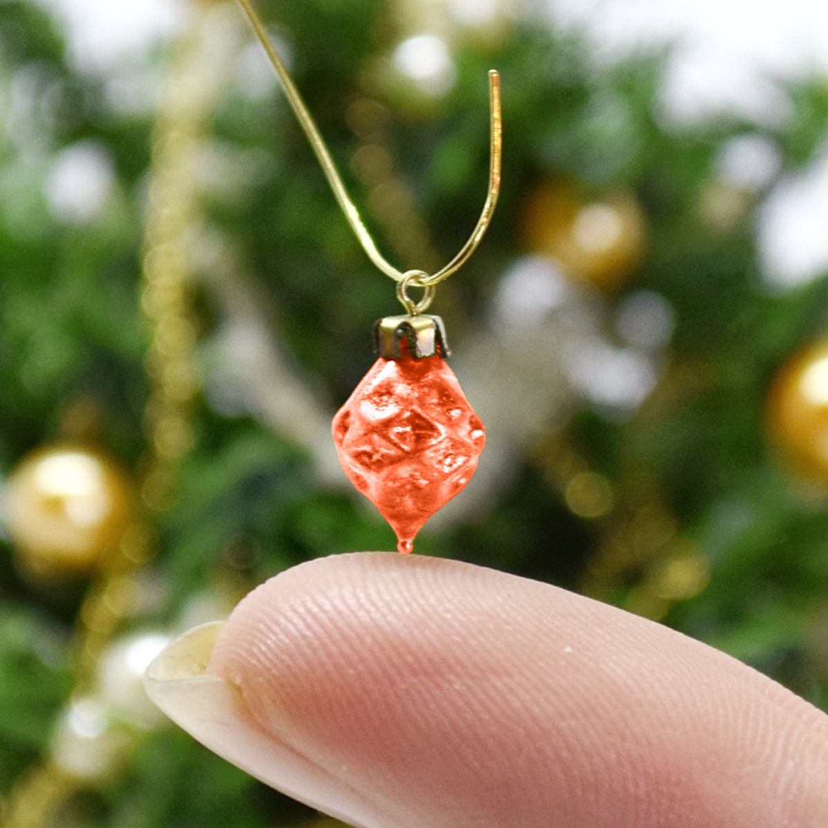 Xmas ornament. Painted. Drop rhombus red.