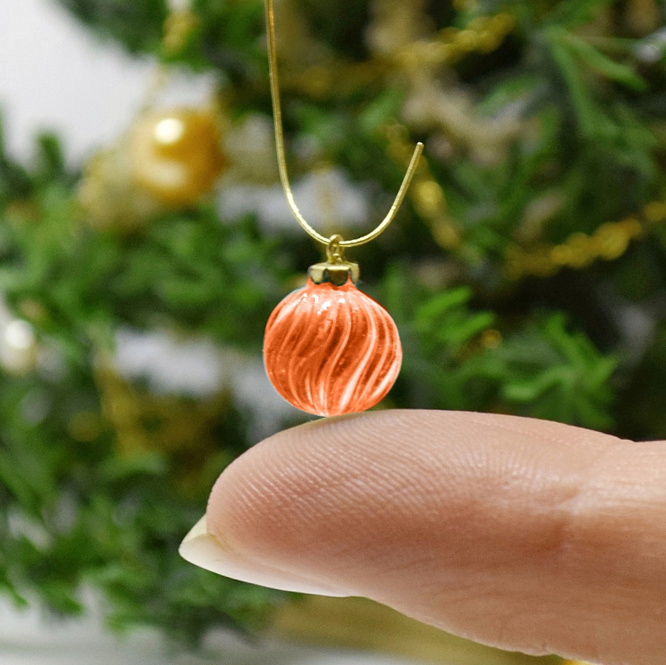 Xmas ornament. Painted. Bauble twisted red.