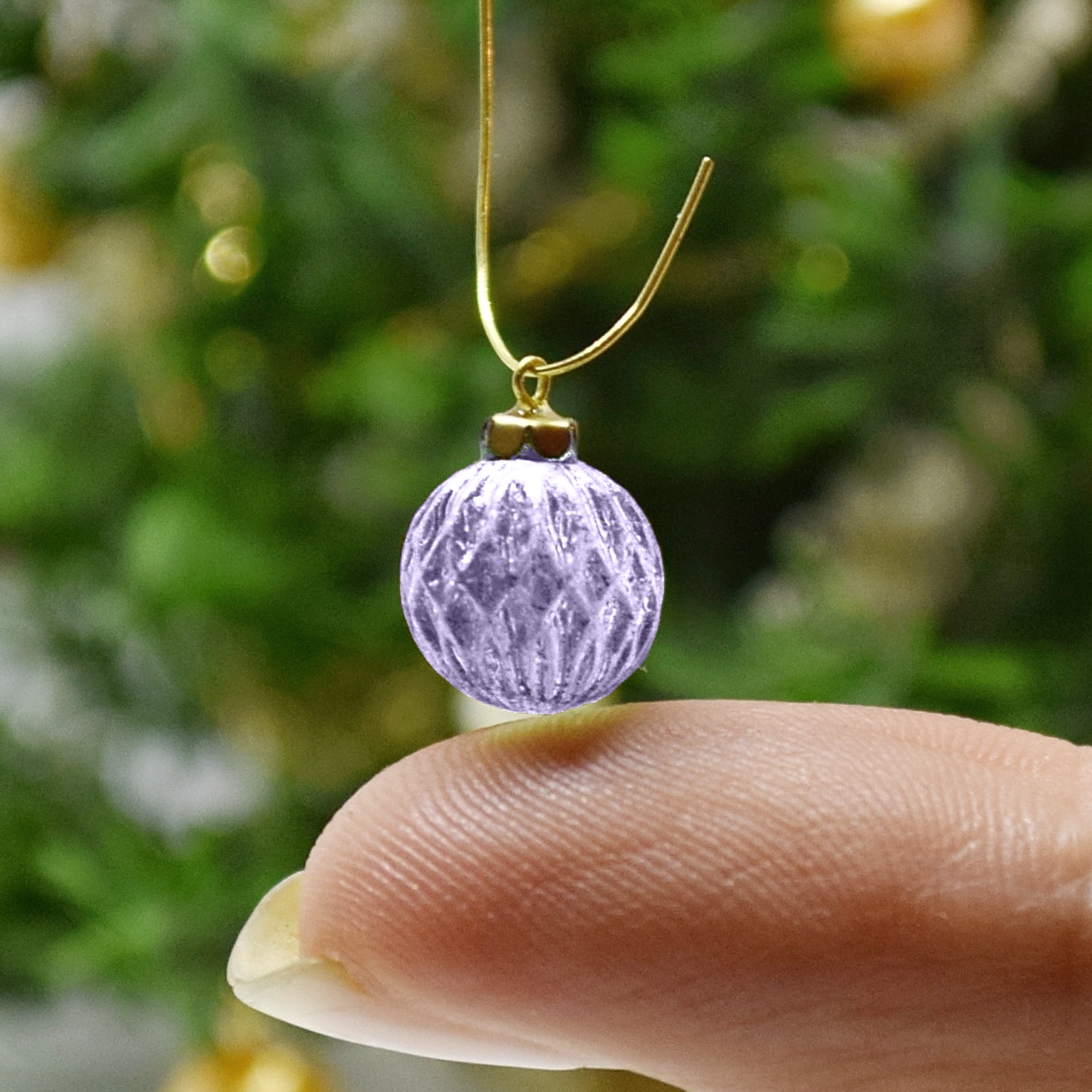 Xmas ornament. Painted. Bauble geometrical purple.