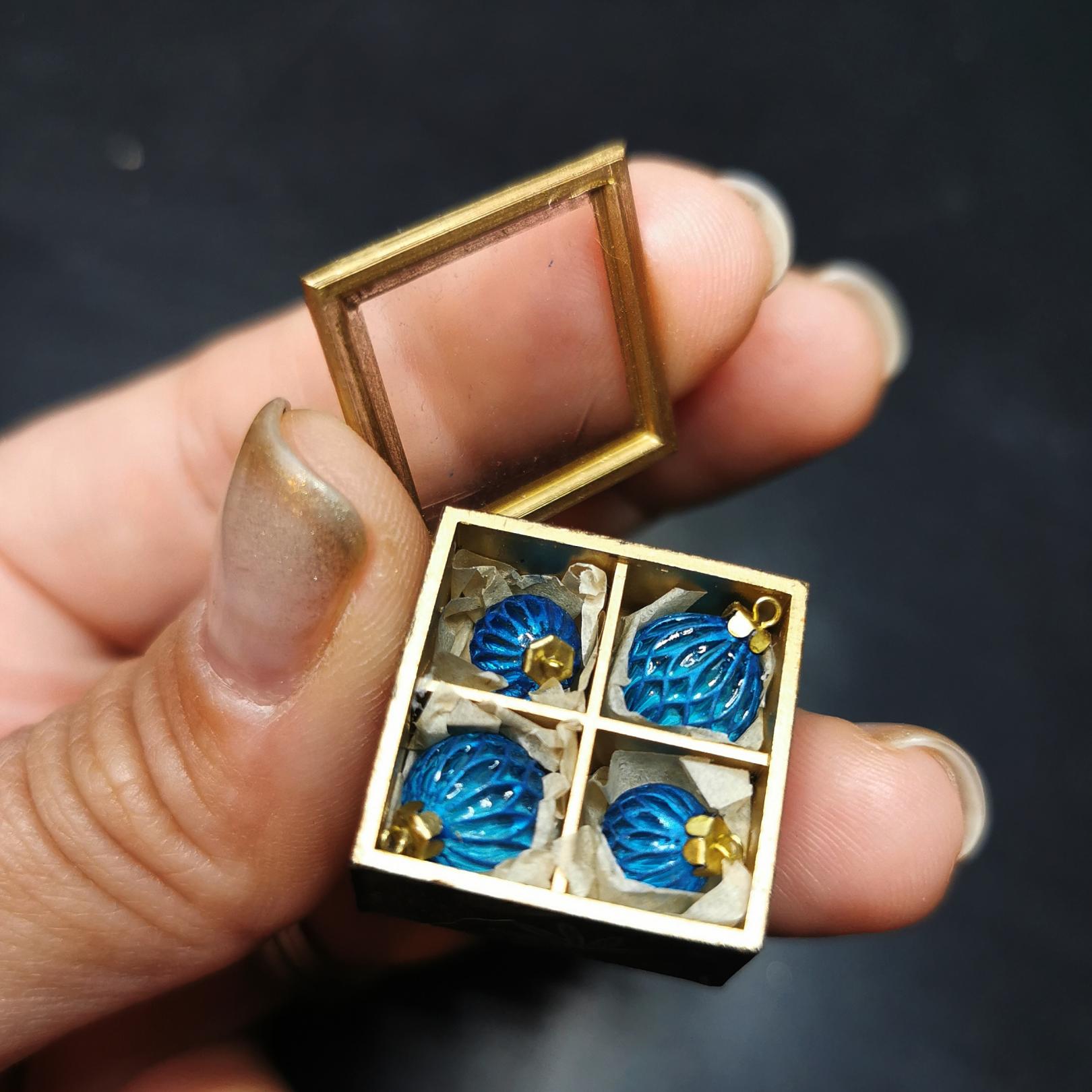 Christmas ornaments set in the box. Lapis blue with metallic effect 4 balls.